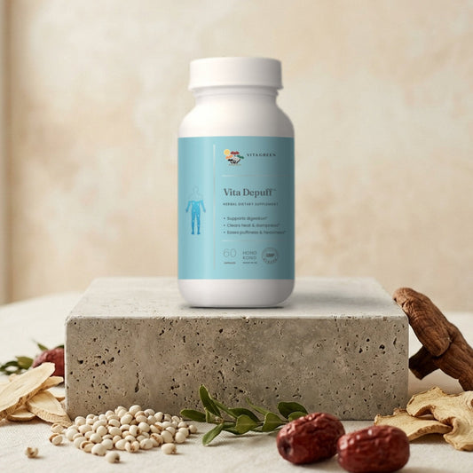 Vita Depuff bottle on stone with dried herbs