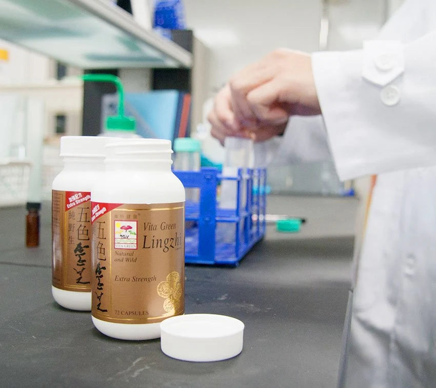 Company laboratory with testing glassware and Lingzhi products
